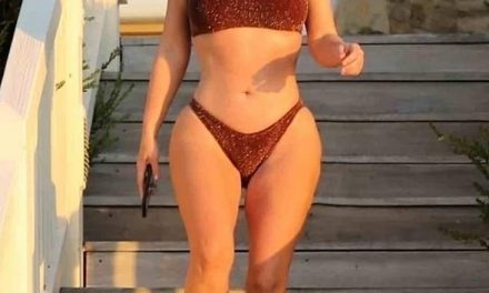 Kim Kardashian on the beach in a swimsuit on May 2020